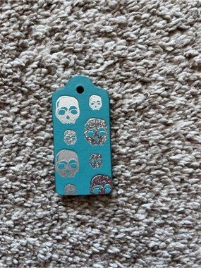 Coach Skull Embossed Leather Hangtag